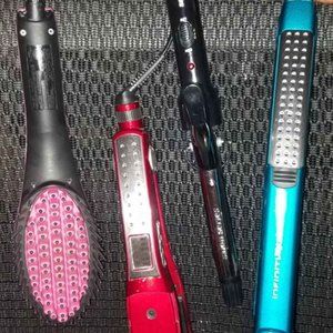 Flat Irons a Curling Iron And A Stratner Hairbrush